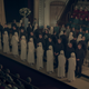 Child brides in opaque veils, meeting their Guardian husbands for the first time at the altar.